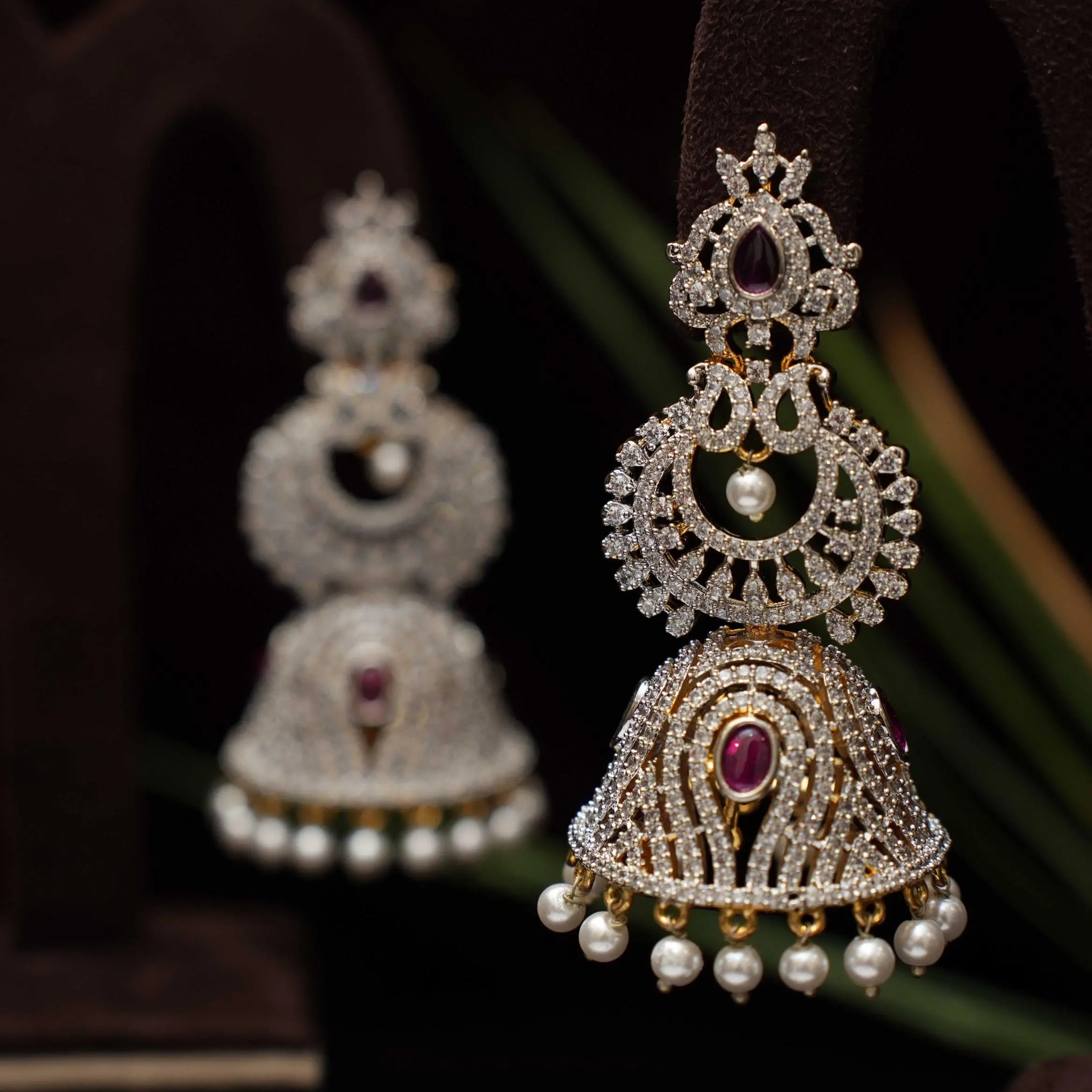 Akruti Zircon Jhumka Earrings - Red