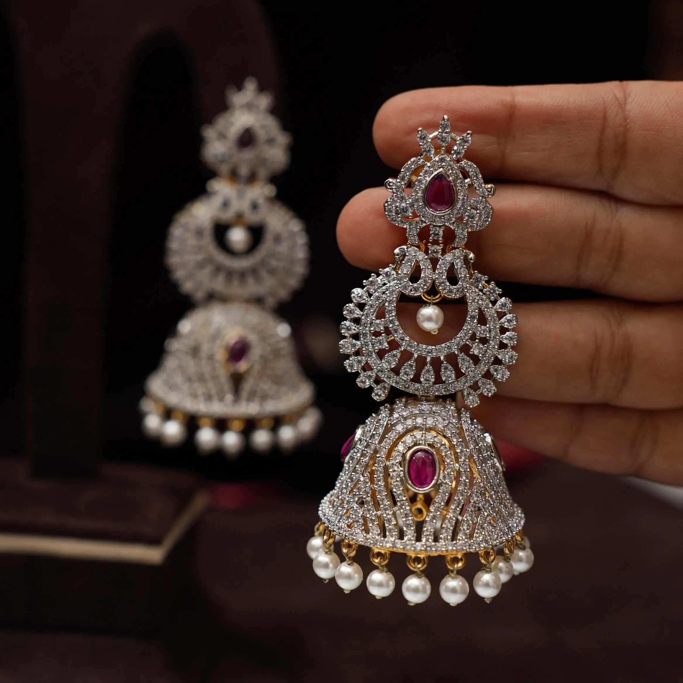 Akruti Zircon Jhumka Earrings - Red