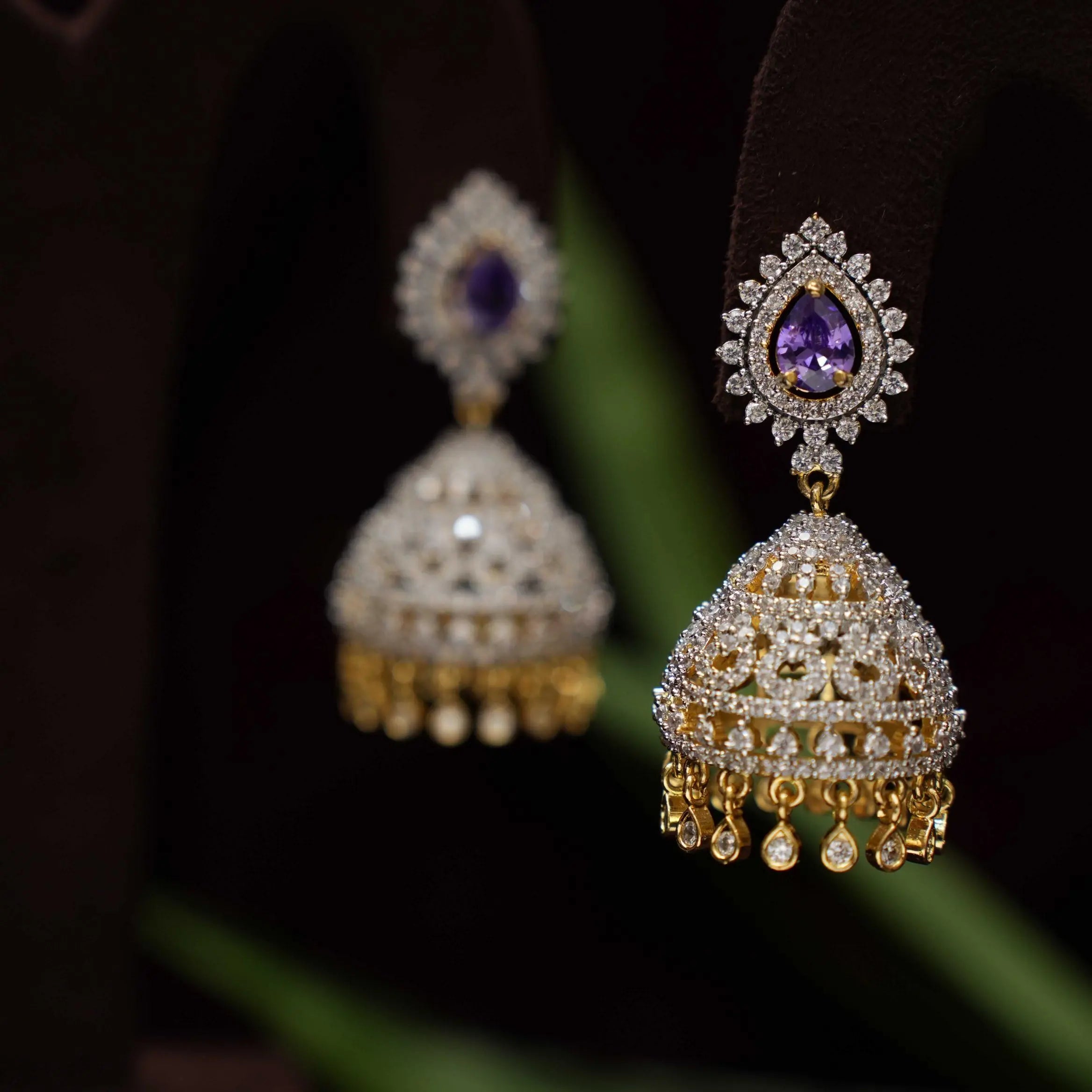 Twiska Zircon Jhumka Earrings