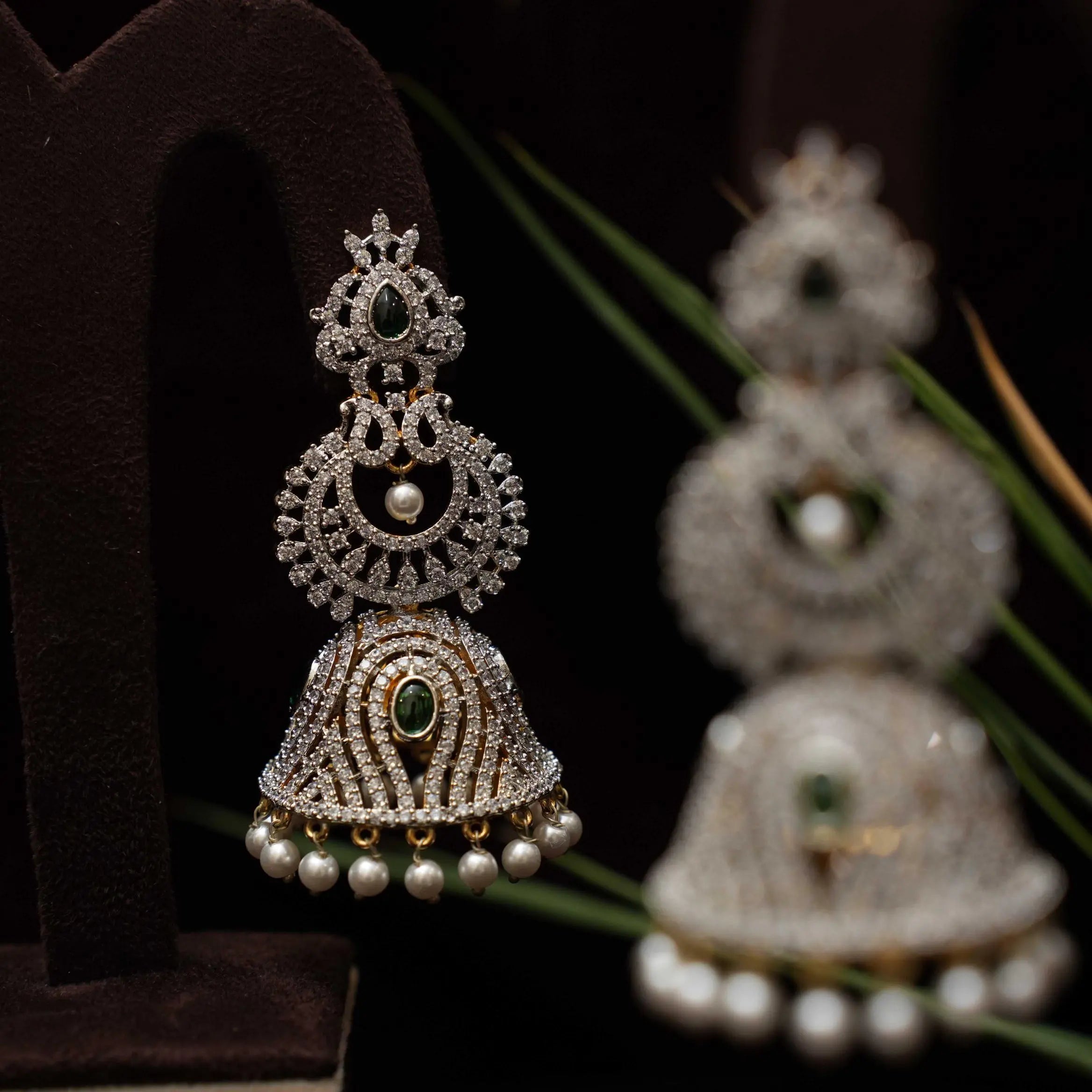 Akruti Zircon Jhumka Earrings - Green